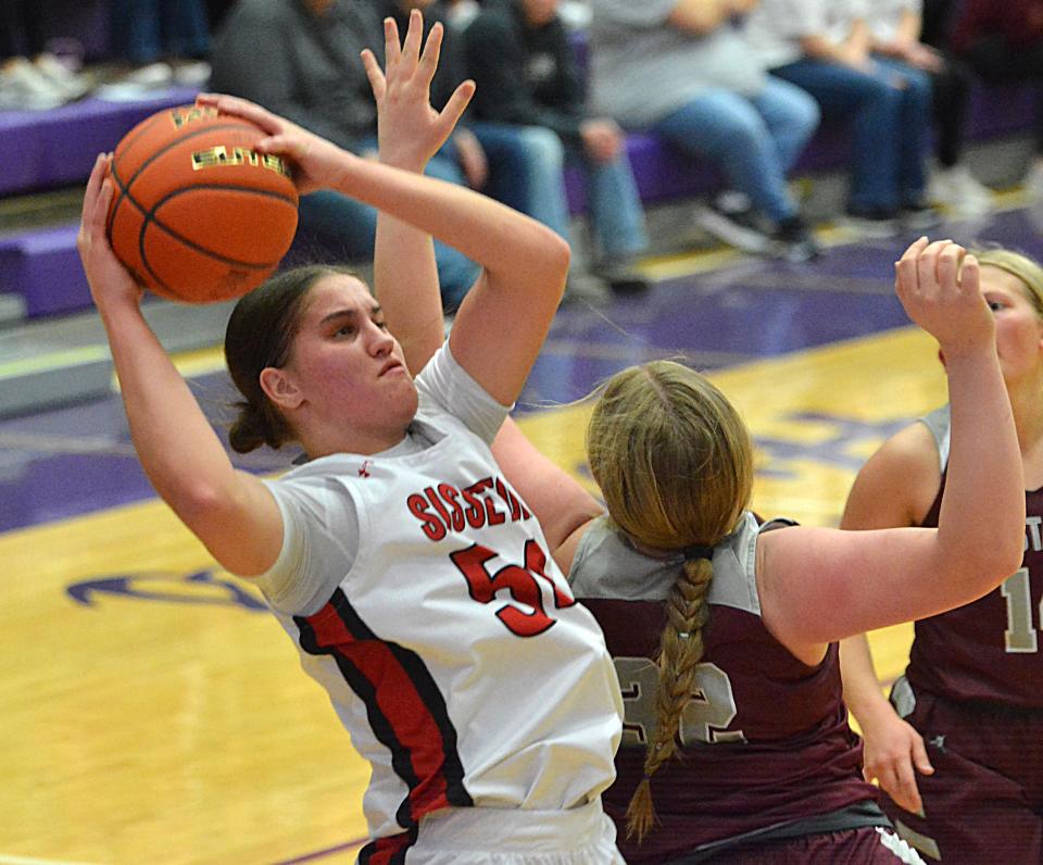 Sisseton's Krista Langager hauls in a pass against Tri-Valley's Emery Pearson during their Class A SoDak 16 girls basketball game on Thursday, Feb. 29, 2024 in the Watertown Civic Arena. Sisseton won 63-52.