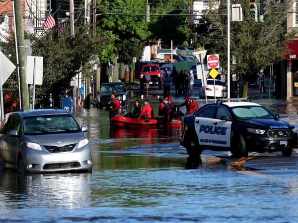 At least 26 people dead in US in hurricane-triggered floods