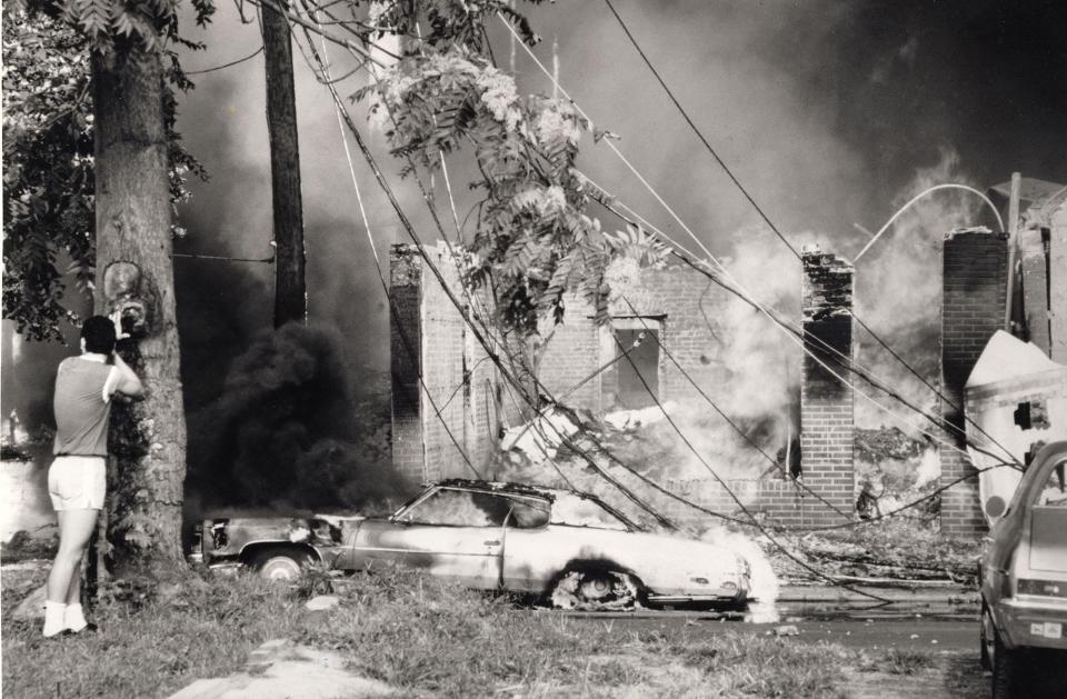 The Passaic Labor Day fire on Sept. 2, 1985, gutted houses and torched cars, leaving smoldering rubble and hulks.