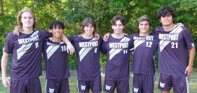 Several members of the 2023 Mayflower Athletic Conference champion Westport boys soccer team.