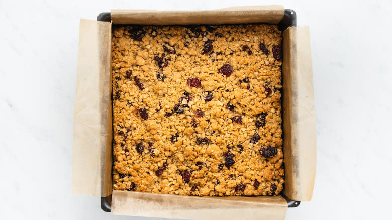 Cranberry oat bar in baking pan