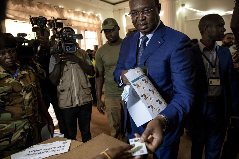 Presidential challenger Anicet-Georges Dologuele casts his vote at the town hall polling station in the capital Bangui, Central African Republic Sunday, Dec. 27, 2020. Voting has begun in Central African Republic's presidential and legislative elections after a campaign period marked by violence between rebels and government forces. (AP Photo)