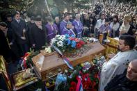 Crowds mourned Kosovo Serb politician Oliver Ivanovic during his funeral on January 18, 2018, two days after he was shot dead