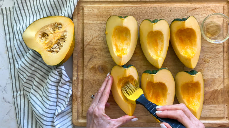 brushing oil on squash