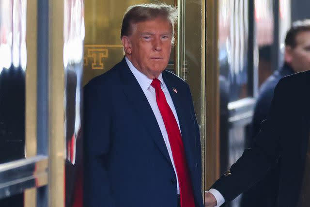 <p>CHARLY TRIBALLEAU/AFP via Getty </p> Donald Trump departs Trump Tower in Manhattan en route to the first day of his criminal trial on April 15, 2024