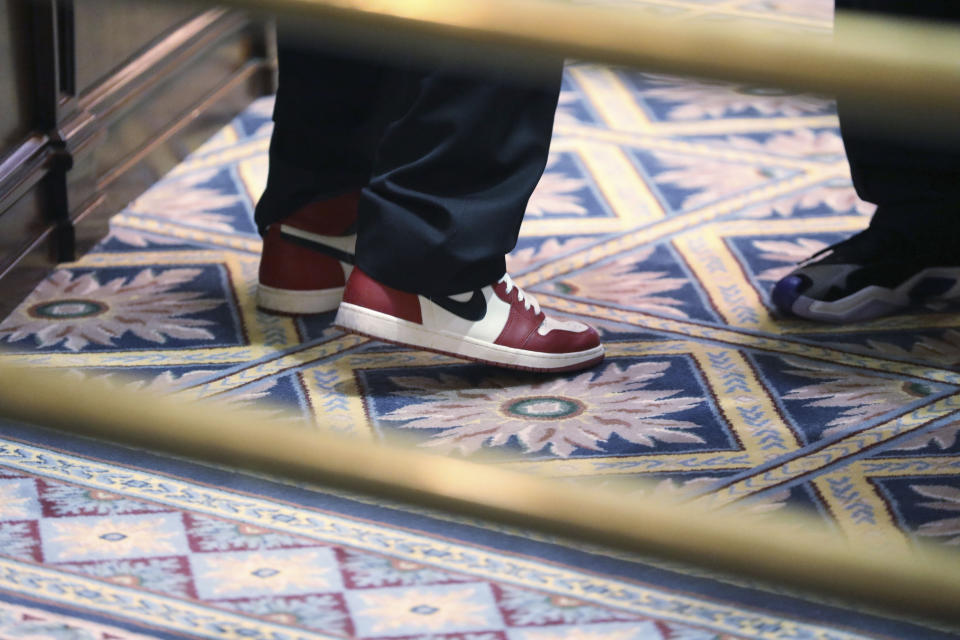 South Carolina Sen. Gerald Malloy, D-Hartsville, wears sneakers to support the American Cancer Society on the Senate floor on Wednesday, Jan. 24, 2024, in Columbia, S.C. (AP Photo/Jeffrey Collins)