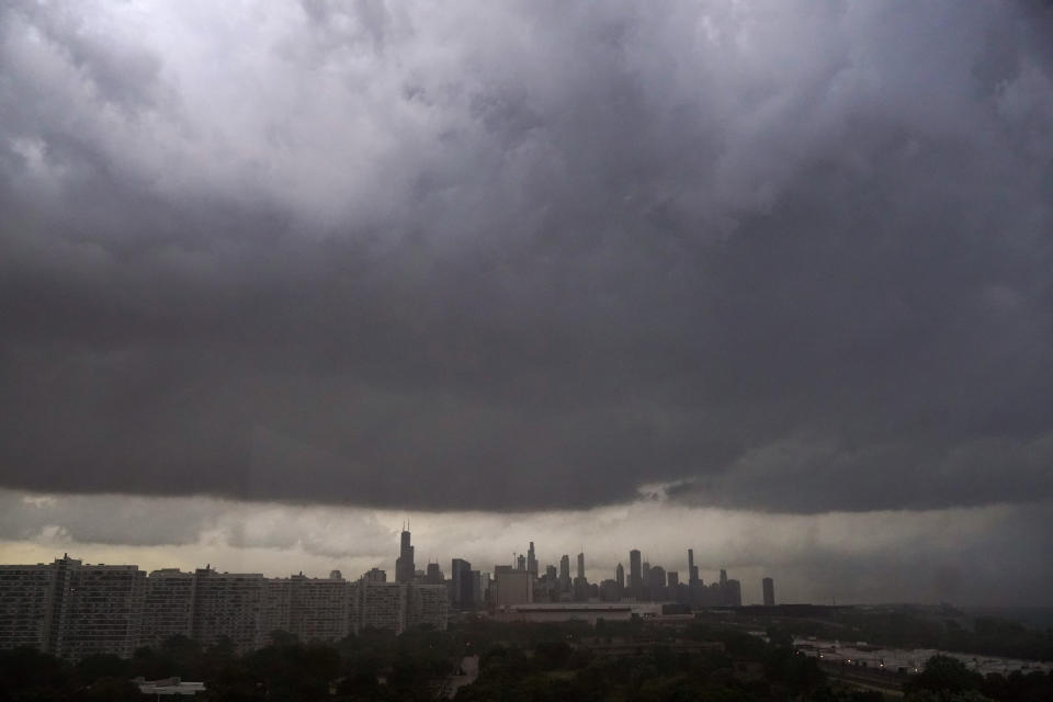 Storm clouds pass over downtown Chicago and the Bronzeville neighborhood of the city heading East out over Lake Michigan as the National Weather Service continued to issue multiple tornado warnings in the greater metropolitan area Wednesday, July 12, 2023. (AP Photo/Charles Rex Arbogast)