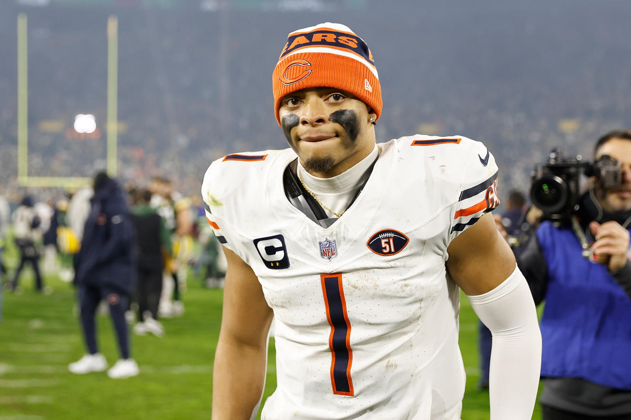 GREEN BAY, WISCONSIN - JANUARY 07: Justin Fields #1 of the Chicago Bears looks on after the game against the Green Bay Packers at Lambeau Field on January 07, 2024 in Green Bay, Wisconsin. (Photo by John Fisher/Getty Images)