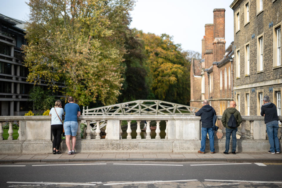 Photo of people standing on a bridge taken with the Nikon Z f