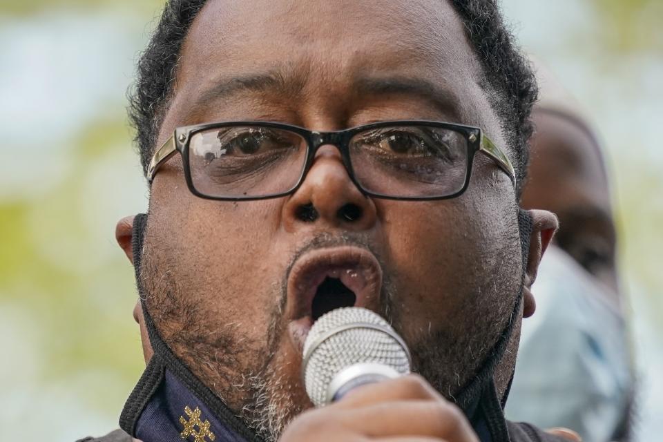 Jacob Blake's father, Jacob Blake Sr. talks to a crowd at a rally Saturday, Aug. 29, 2020, in Kenosha, Wis. (AP Photo/Morry Gash)