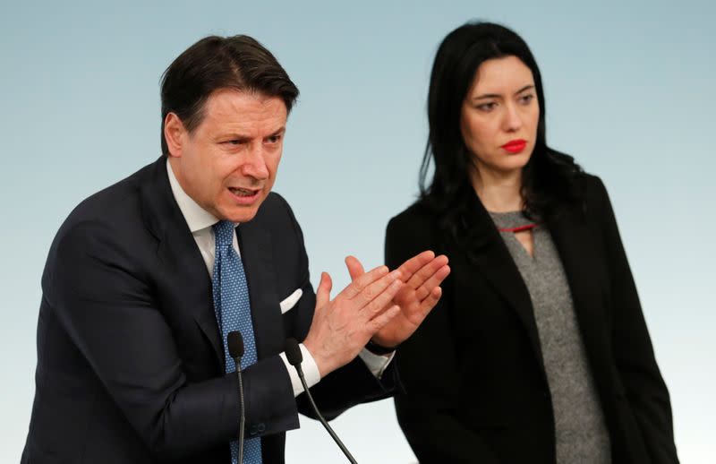 Italian Prime Minister Giuseppe Conte speaks to media as he announces a decree that will close cinemas, schools in order to contain the coronavirus, in Rome