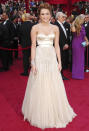 <b>Miley Cyrus</b> <br><br>Miley Cyrus looked every part of a Hollywood star when she wore this champagne-coloured gown to the 2010 Oscars.<br><br>The combination of silk, a dusting of sparkle and a clinched in waist makes this dress a red carpet winner for the young starlet.