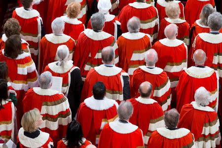 FILE PHOTO: Members of the House of Lords listen to Britain's Queen Elizabeth deliver the Queen's Speech, during the State Opening of Parliament in central London, on May 18, 2016. REUTERS/Justin Tallis/Pool/File Photo