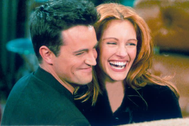 <p>Liaison/Getty</p> Matthew Perry and Julia Roberts on 'Friends'