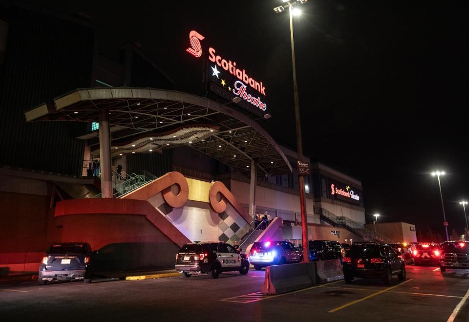 Police investigate the scene of a multiple shooting at West Edmonton Mall in Edmonton, Alberta on Monday. Police say three people have been seriously injured in a shooting at West Edmonton Mall. 