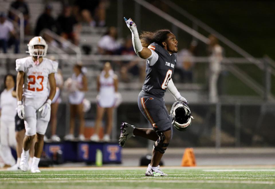 Skyridge’s Deshawn Toilolo celebrates his game winning interception against Timpview in Lehi on Friday, Aug. 11, 2023. Skyridge won 26-14. | Scott G Winterton, Deseret News