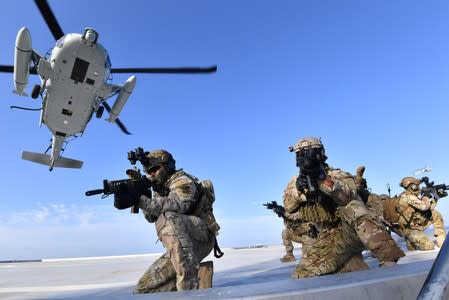 Members of South Korean Naval Special Warfare Group take part in a military exercise in remote islands called Dokdo