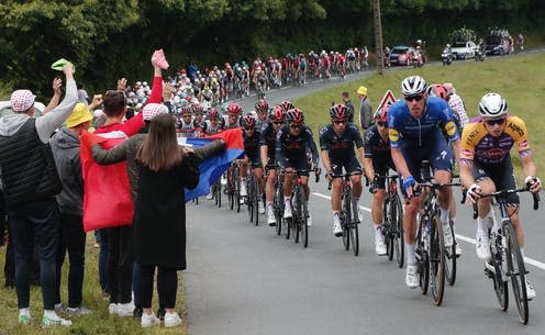 <span class="caption">Spectators are an integral part of the history and culture of the Tour de France.</span> <span class="attribution"><a class="link " href="https://webgate.epa.eu/?16634349628007773501&MEDIANUMBER=57001040" rel="nofollow noopener" target="_blank" data-ylk="slk:Guillaume Horcajuelo/EPA-EFE;elm:context_link;itc:0;sec:content-canvas">Guillaume Horcajuelo/EPA-EFE</a></span>