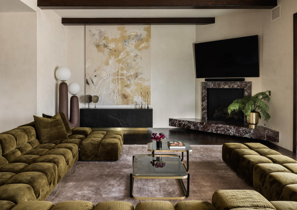 A living room drenched in earthy tones