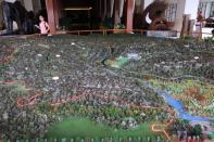 Model of real estate property "Viva Villa" developed by Ping An Real Estate is seen at a showroom in Xishuangbanna, Yunnan