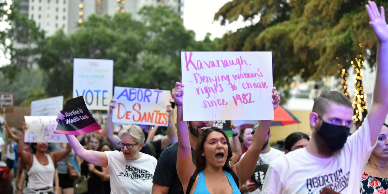 About 200 demonstrators gather in downtown Sarasota in June 2022 to protest the U.S. Supreme Court's reversal of Roe v. Wade.