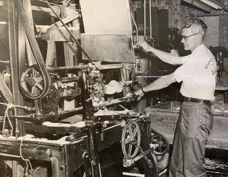 Ralph VanderVeen working the machines at The Wooden Shoe Factory in Holland