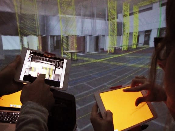 Smartphones and tablets can become translucent "controlling plane" to select and manipulate objects in a 3D world.