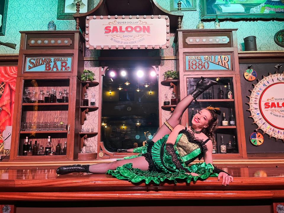 Heather Stolfa poses for a photo in the Saloon at Silver Dollar City in 2023. Stolfa has performed at the Saloon for five years.