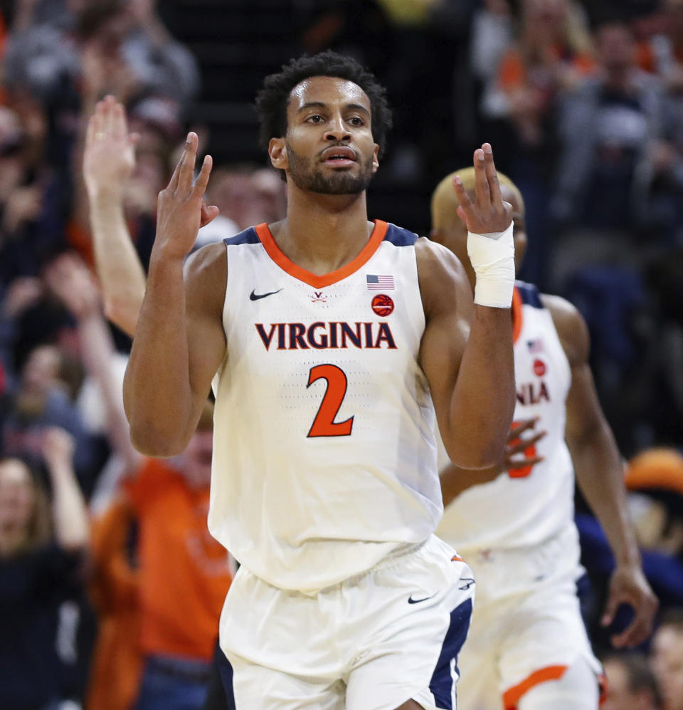 Virginia guard Braxton Key (2) reacts after shooting a 3-point basket during an NCAA college basketball game against Duke Saturday, Feb. 29, 2020, in Charlottesville, Va. (AP Photo/Andrew Shurtleff)