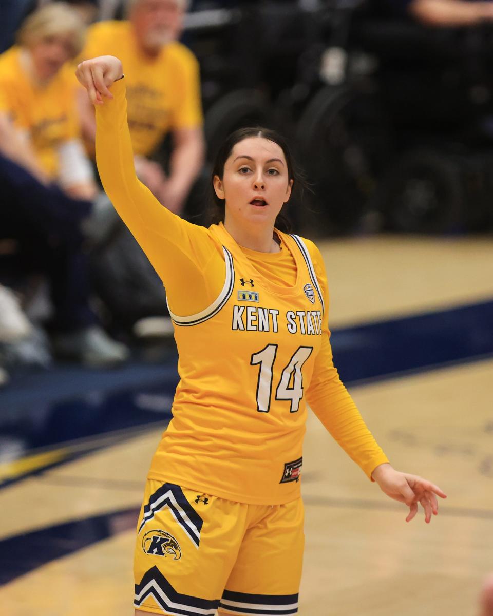 Kent State guard Katie Shumate watches her 3-point shot drop into the basket during last season's game against the Ohio University Bobcats at the M.A.C. Center.