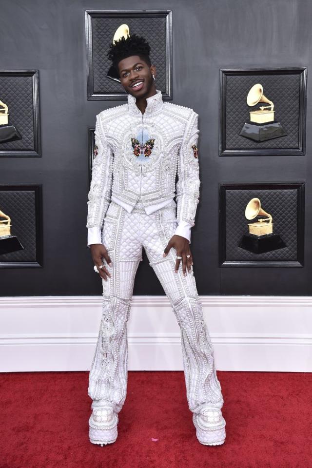 Lil Nas X Is Glamorous in Pearl Jacket, Flare Pants and Extreme Platforms  at Grammy Awards 2022