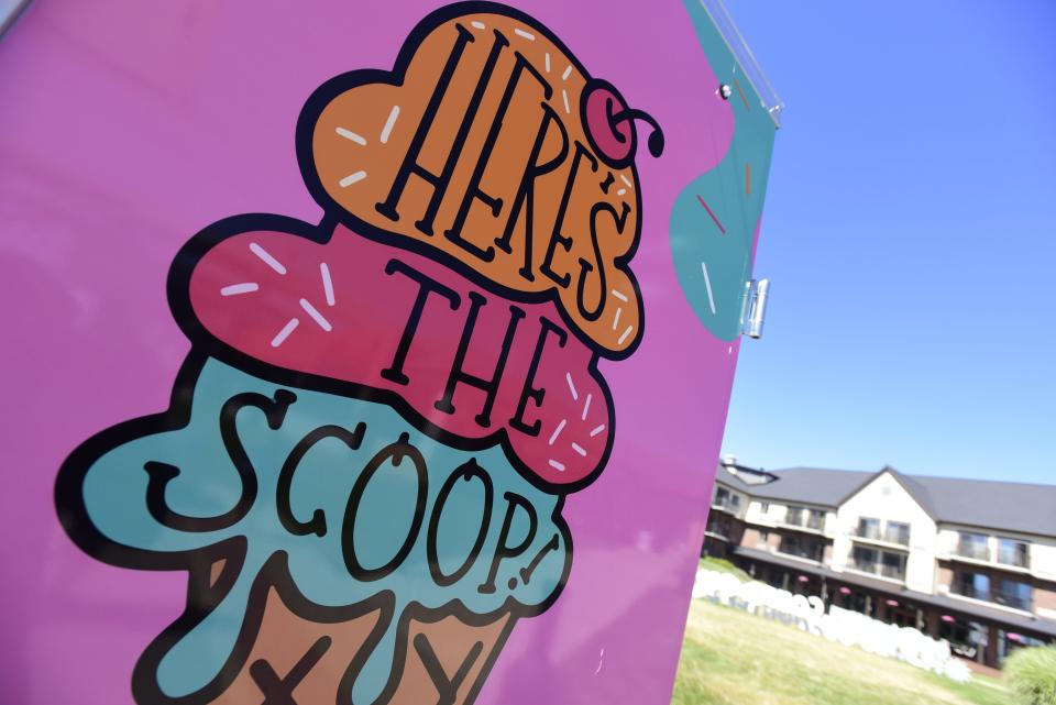 The new ice cream truck Here's The Scoop parked on the waterfront along Thomas Edison Parkway on Friday, July 29, 2022. The bright pink truck serves ice cream cones, ice cream flights, sundaes and waffles nachos, or waffles chips smothered in ice cream, syrup and toppings of the customer's choice.