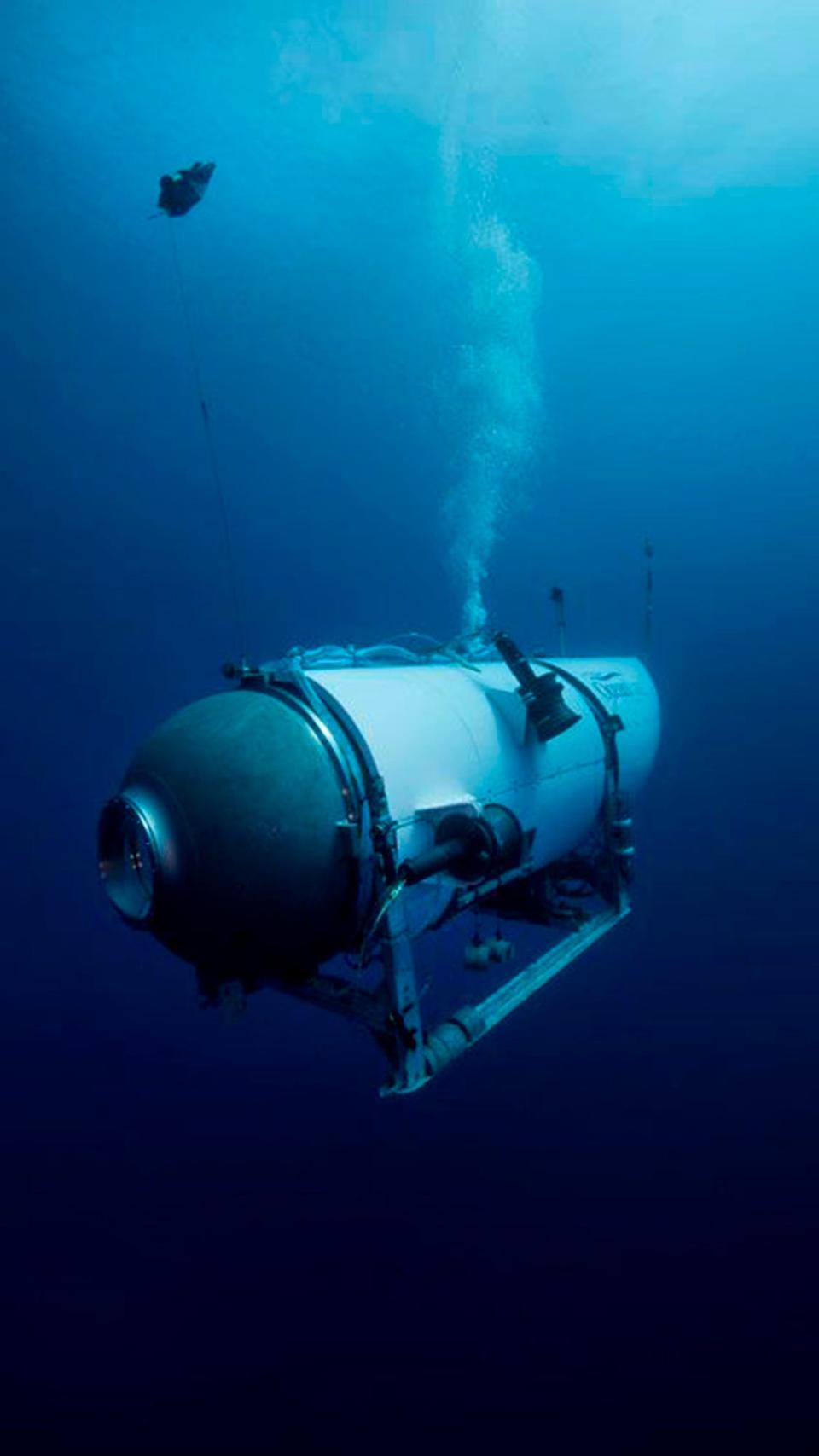 FILE - This undated photo provided by OceanGate Expeditions in June 2021 shows the company's Titan submersible. On Monday, June 19, 2023, a rescue operation was underway deep in the Atlantic Ocean in search of the technologically advanced submersible vessel carrying five people to document the wreckage of the Titanic, the iconic ocean liner that sank more than a century earlier. (OceanGate Expeditions via AP, File) ORG XMIT: NYSB152