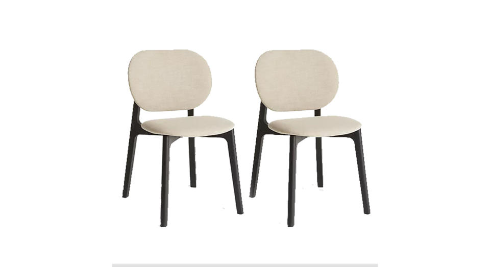 These kitchen chairs have upholstered seats and sturdy oak legs.