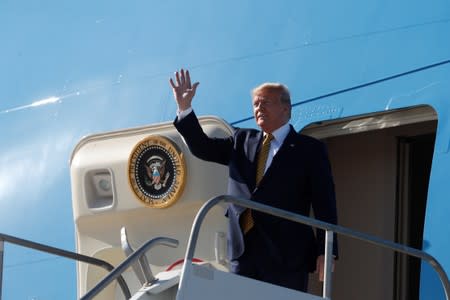 FILE PHOTO: U.S. President Donald Trump disembarks from Air Force One at Los Angeles International Airport in Los Angeles