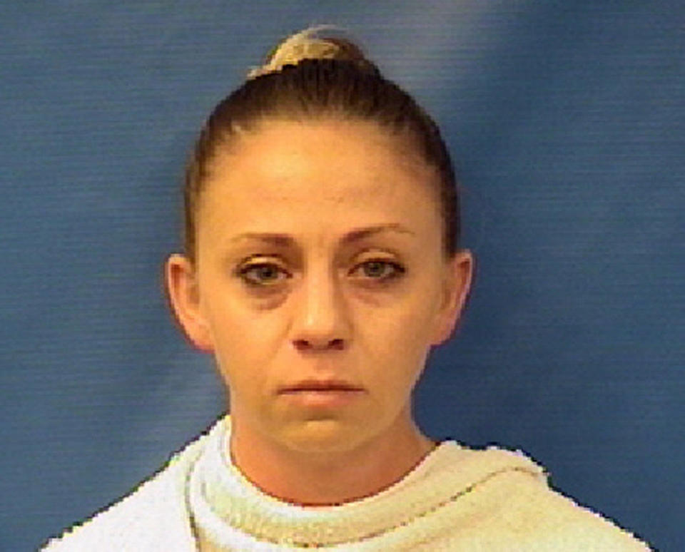 This photo provided by the Kaufman County Sheriff's Office shows Amber Renee Guyger. Guyger, a Dallas police officer, was arrested Sunday, Sept. 9, 2018, on a manslaughter warrant in the shooting of a black man at his home, Texas authorities said. The Texas Department of Public Safety said in a news release that Guyger was booked into the Kaufman County Jail and that the investigation is ongoing. It said no additional information is available at this time. (Kaufman County Sheriff's Office via AP)