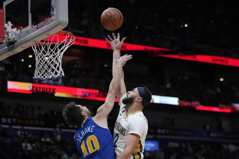 New Orleans Pelicans forward Larry Nance Jr. (22) shoots over Golden State Warriors guard Ty Jerome (10) in the first half of an NBA basketball game in New Orleans, Monday, Nov. 21, 2022. (AP Photo/Gerald Herbert)