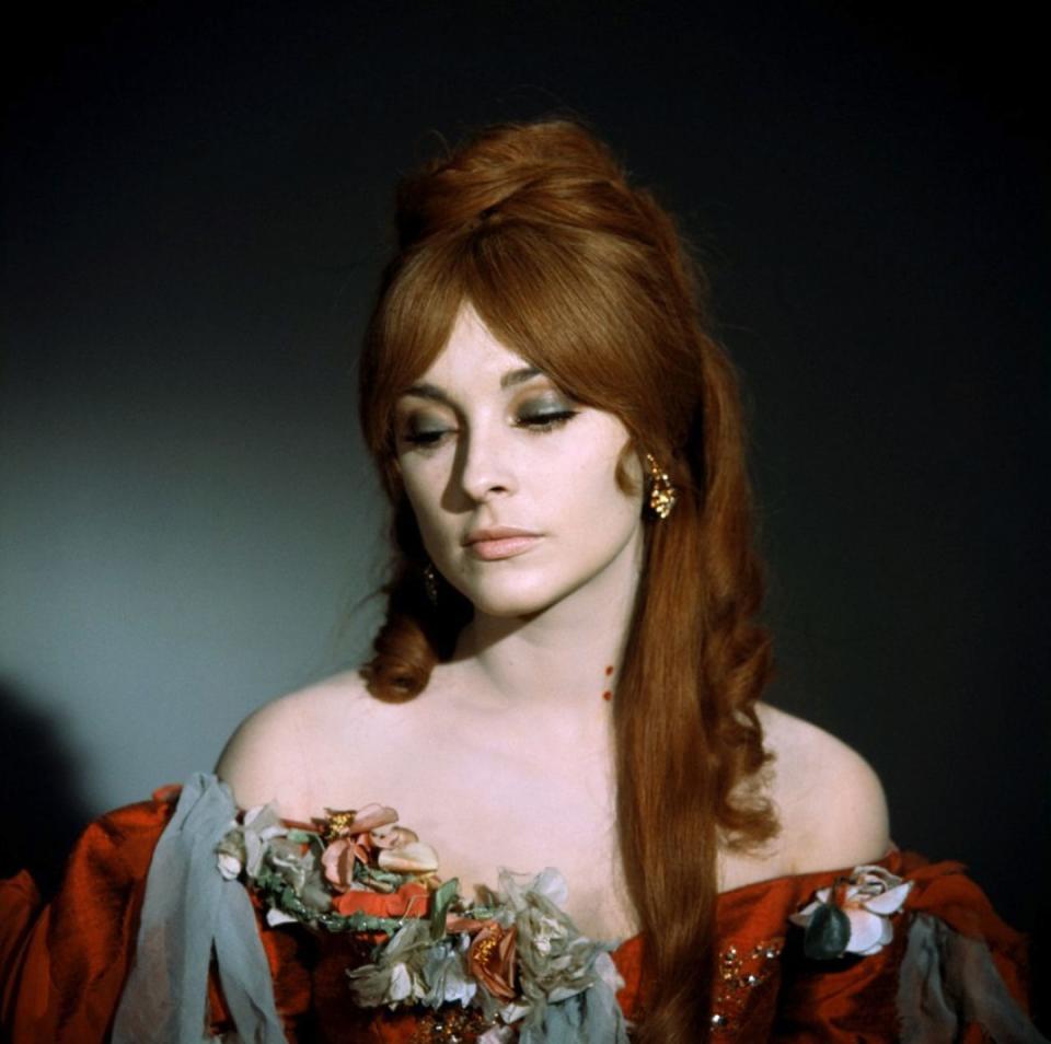 <p>Sharon Tate wore a striking pair of large citrine pendant earrings in <em>The Fearless Vampire Killers</em>. The jewels looked striking against the auburn wig she wore for the role.  </p>