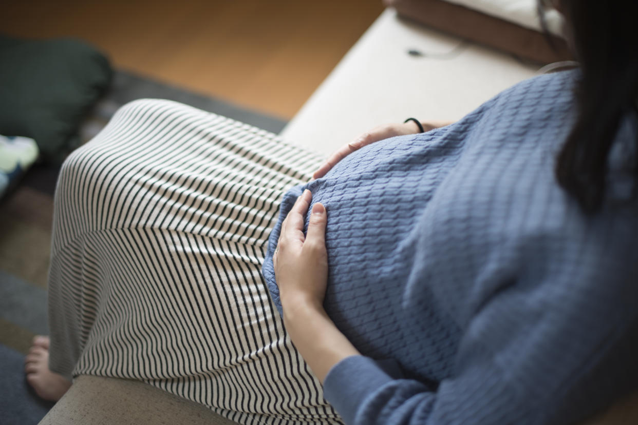 The CDC says that mother-to-child transmission of coronavirus during pregnancy is “unlikely” but notes that a “very small number” of babies have tested positive for the virus soon after birth. (Credit: Getty)