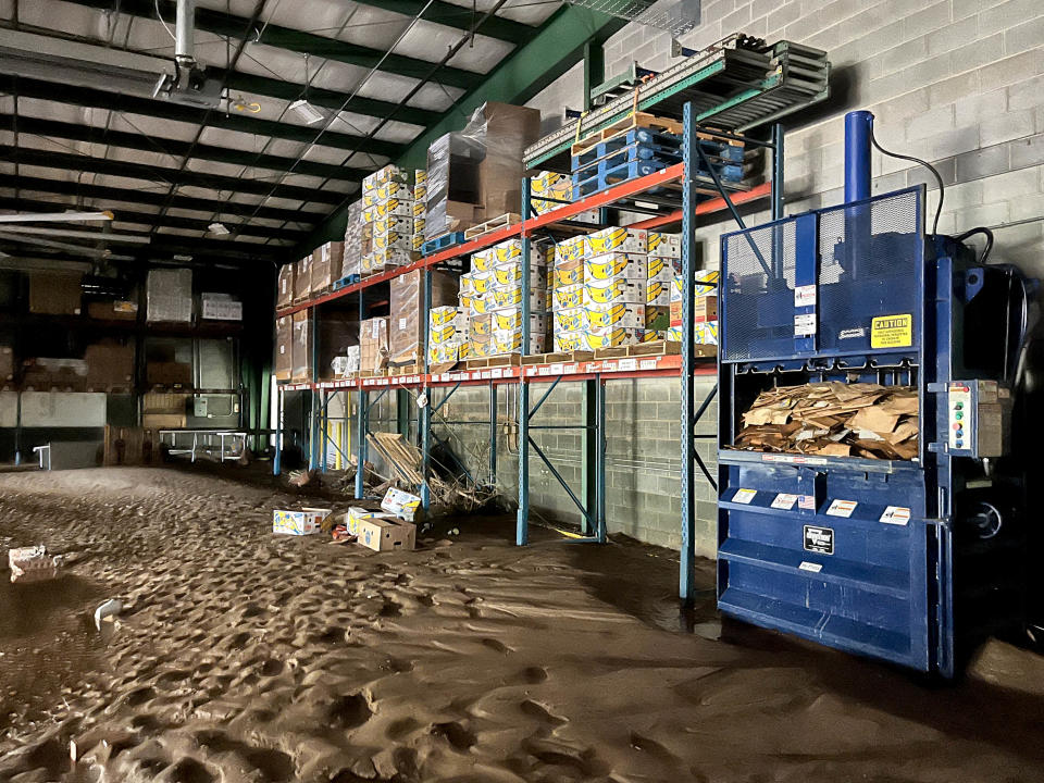 MANNA FoodBank's facility at 627 Swannanoa River Road was destroyed by floodwaters from the Swannanoa River during Tropical Storm Helene.