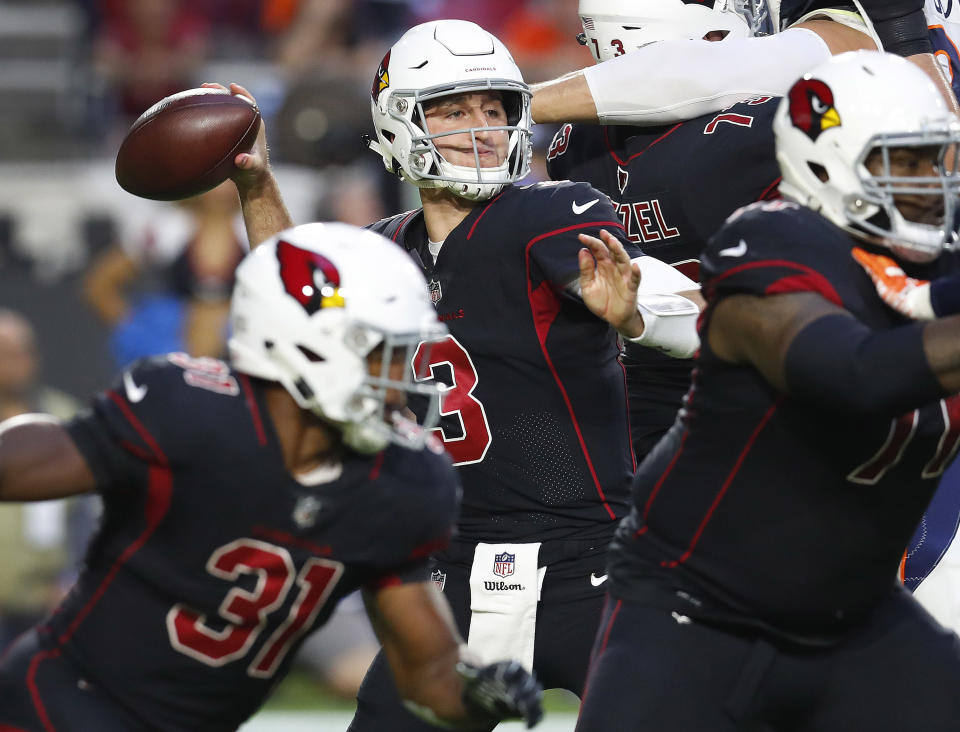 Arizona Cardinals quarterback Josh Rosen threw two pick-sixes in the first quarter against the Broncos. (AP)