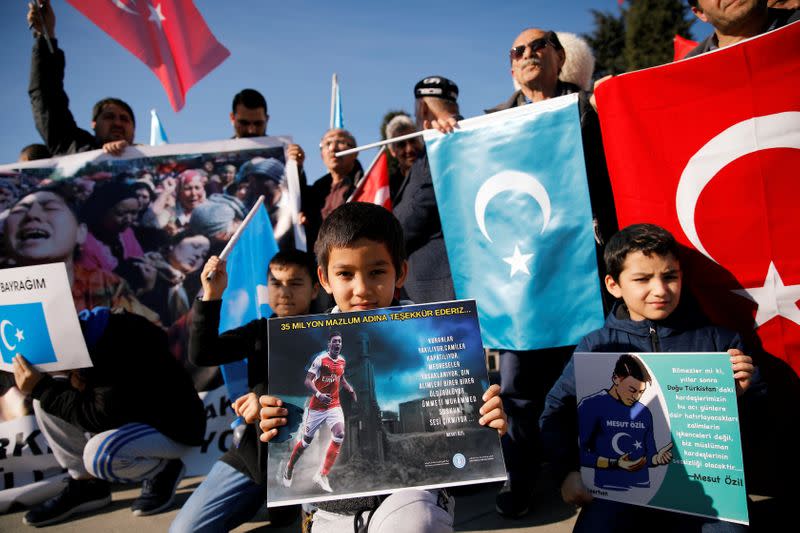 Ethnic Uighur demonstrators attend a protest against China in Istanbul