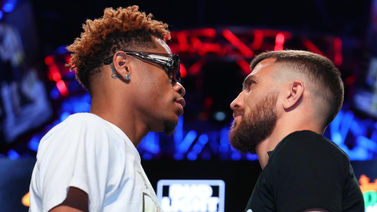   Devin Haney (L) and Vasiliy Lomachenko (R) face-off during the press conference prior to their May 20 Undisputed lightweight championship fight at MGM Grand Hotel & Casino on May 17, 2023 in Las Vegas 