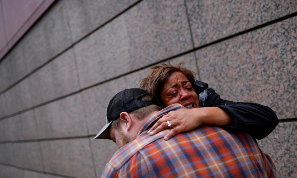 People react to the guilty verdict of Derek Chauvin in front of Hennepin county government center.