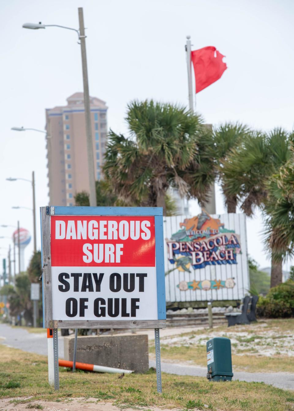 Red flags fly at Pensacola Beach as a storm approaches the Pensacola, Florida area on Wednesday, April 10, 2024.