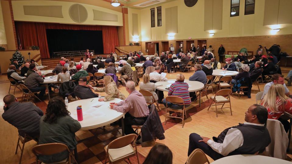 Akron residents crowded Zwisler Hall to discuss the wetlands off of White Pond Drive, Tuesday, Nov. 29, 2022, in Akron, Ohio.