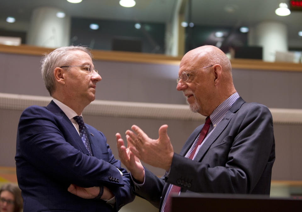 Romania's Minister for European Affairs George Ciamba, left, speaks with Sweden's European Affairs Minister Hans Dahlgren during a meeting of EU ministers for European Affairs at the EU Council building in Brussels, Tuesday, March 19, 2019. Germany's European affairs minister Michael Roth says Brexit is not a game and that the EU is worn out by two years of tortuous and interminable negotiations over Britain's departure from the bloc. (AP Photo/Virginia Mayo)