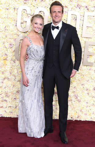 <p>Steve Granitz/FilmMagic</p> Kayla Radomski (L) and Jason Segel (R) at the 2024 Golden Globes