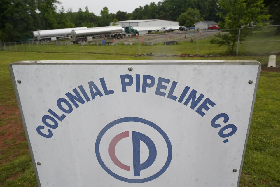 FILE - Tanker trucks are parked near the entrance of Colonial Pipeline Company Wednesday, May 12, 2021, in Charlotte, N.C. The Colonial Pipeline says a diesel fuel leak in Virginia has shut down part of the nation’s largest fuel pipeline, but it is expected to restart Saturday, Jan. 7, 2023. Colonial spokesperson David Conti says the spill was discovered Tuesday. (AP Photo/Chris Carlson, File)