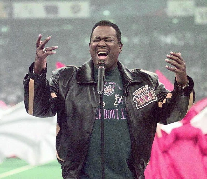 Singer Luther Vandross sings the US National Anthem at the Louisiana Superdome Jan. 27, 1997 before the start of Super Bowl XXXI in New Orleans, Louisiana. The Green Bay Packers played&nbsp;the New England Patriots in the Super Bowl.